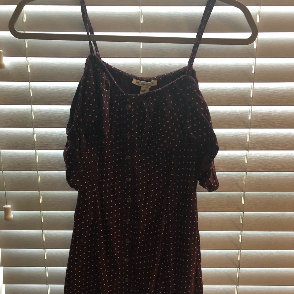 Polka dot maroon off the shoulder dress.